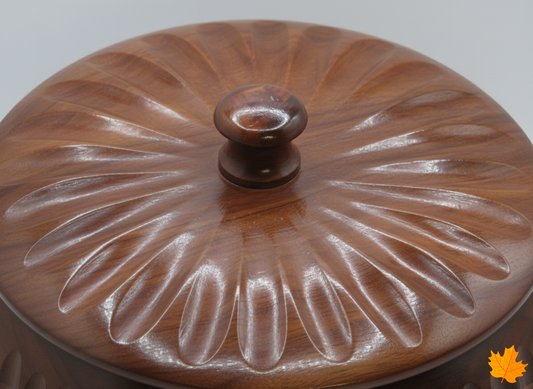 Premium Kashmiri Walnut Wooden lid with decorative patterns and a central knob on a plain background