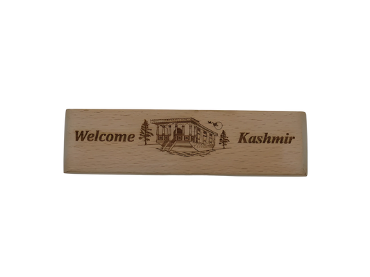 Wooden plaque with engraved text and design