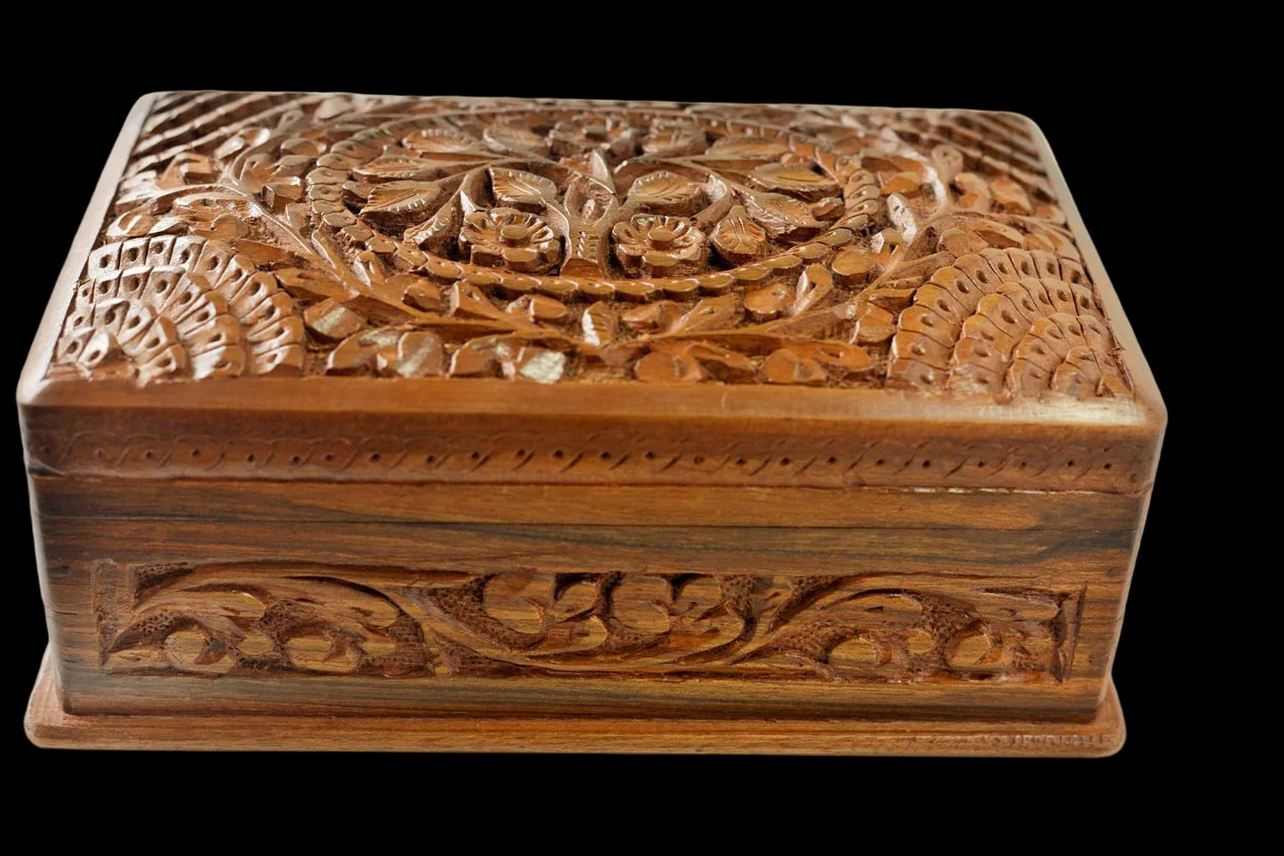 Handcrafted wooden storage box with floral carving
