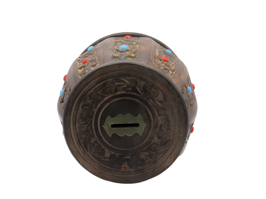 Handcrafted wooden money gullak with floral carving