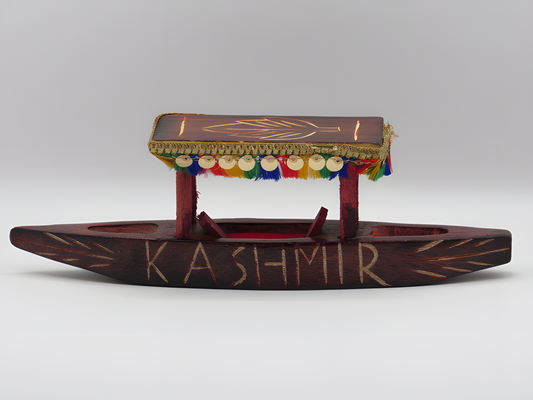Model of a wooden boat with 'Kashmir' written on it