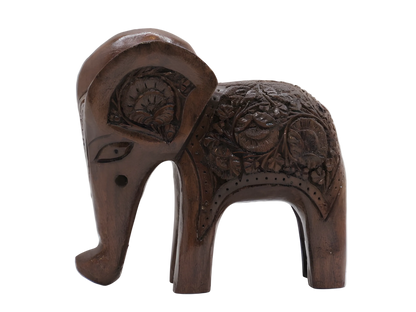 Handcarved wooden elephant figurine with floral detailing