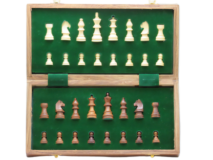 Wooden chess set with green felt board on a white background