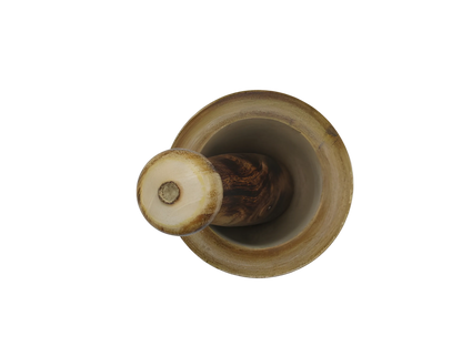 Wooden pepper grinder on a white background