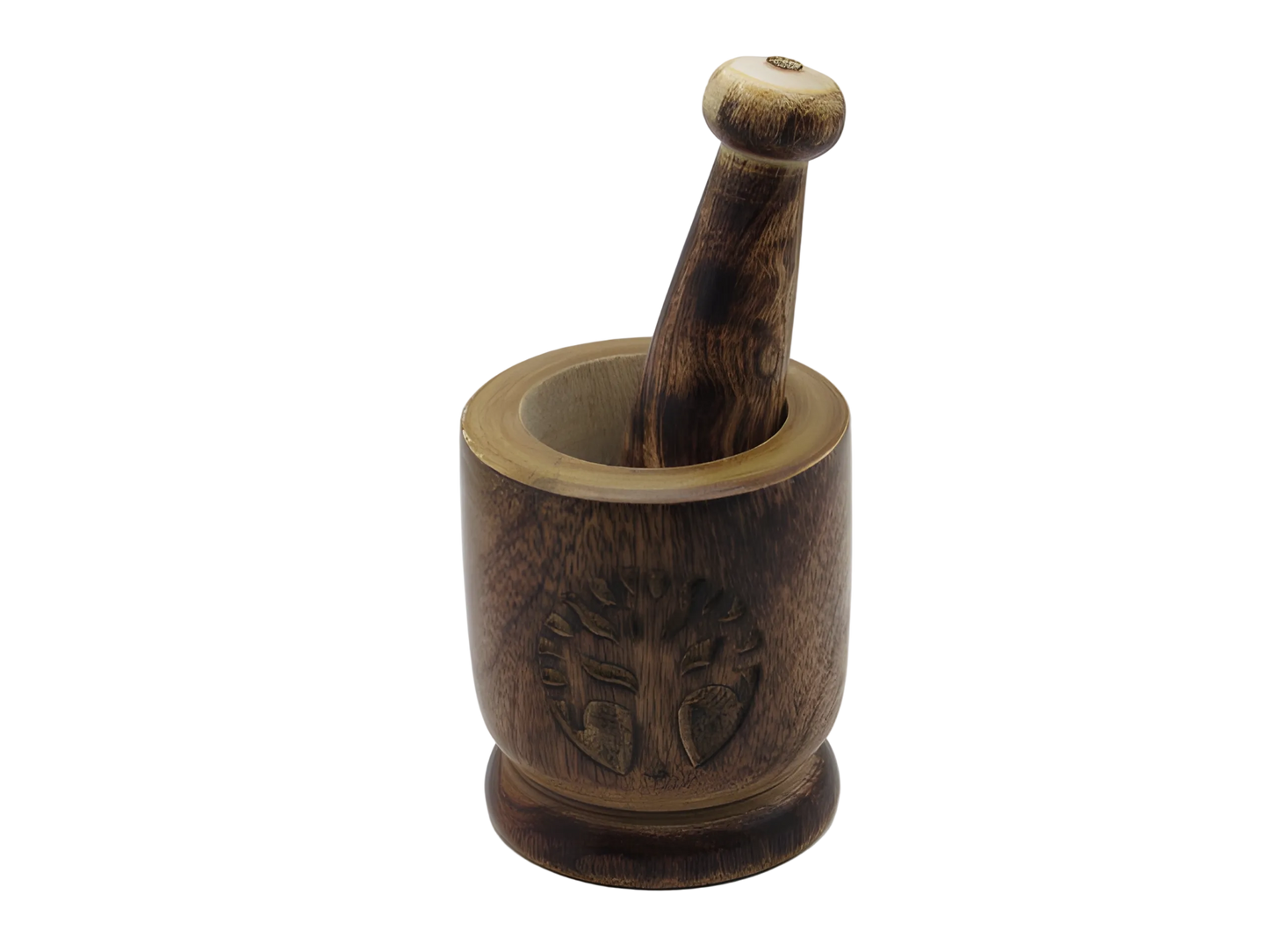 Wooden mortar and pestle with intricate carvings on a white background