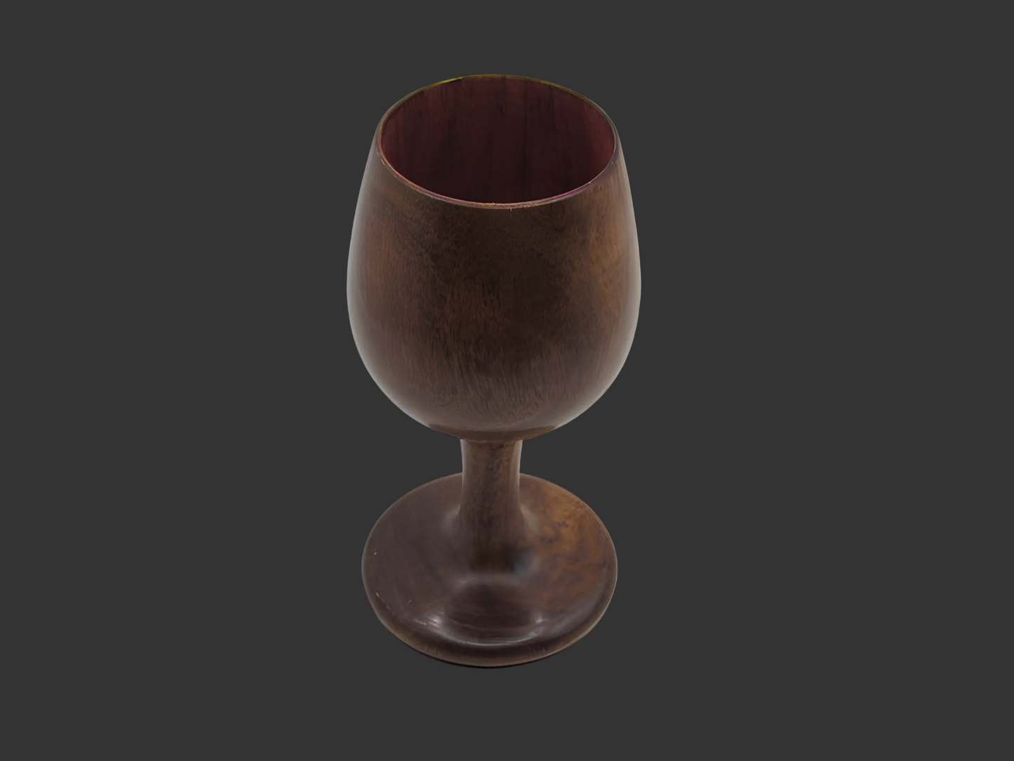 Wooden goblet on a white background