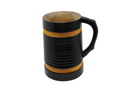 Black mug with yellow stripes on a white background