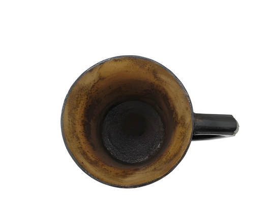 Brown ceramic mug on a white background